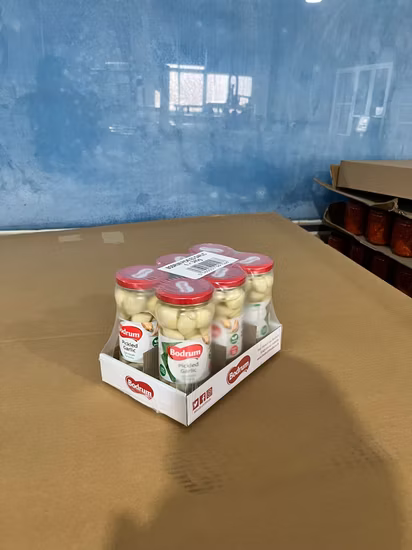 Ajo encurtido en salmuera envasado en frascos de vidrio para venta al por menor